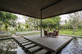 A Koi-Filled Moat Surrounds This Vietnamese House - Photo 9 of 16 - 