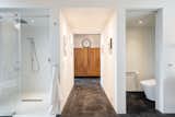 Bath Room, One Piece Toilet, Recessed Lighting, Soaking Tub, and Concrete Floor  Photo 14 of 32 in Art Stable | Modern Creator's Loft by Michael Doyle Properties