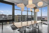 Dining room with an impressive display of Nelson® Pendant Lamps