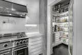 The pantry was designed so that all countertop appliances were tucked away, thus eliminating clutter in the kitchen.