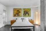 The Master Bedroom was designed to easily accommodate a King size bed. Radiant heat around the bed keeps the concrete floor cool in summer, and warm in winter.