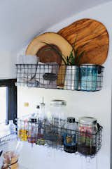 “Storage baskets are my current obsession,” Tina says. “If they attach to the wall, even better.”