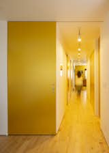 Hallway with gold doors