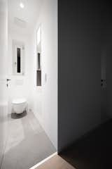 Bath Room, Ceramic Tile Floor, and One Piece Toilet  Photo 4 of 20 in High-Class Minimalism - Terézváros by Konkrét Stúdió