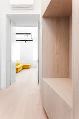 Hallway and Light Hardwood Floor  Photo 14 of 20 in High-Class Minimalism - Terézváros by Konkrét Stúdió