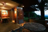 A patio off the kitchen gives easy access to al fresco dining and the outdoor grill, while taking in the mountaintop vista.