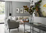Den with a Montauk Sofa, Custom coffee table and Holly Hunt Drapery