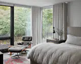 Primary Bedroom with Holly Hunt Drapery and Eames Lounge Chair