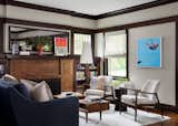Living Room with original fireplace and built-ins