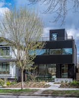 Exterior, Flat RoofLine, Metal Roof Material, House Building Type, and Metal Siding Material Front Day Angle View  Photo 15 of 48 in Black is the New Black by Joanne Madeo