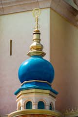Moana is represented in her tower through an earthy color palette. A sea-blue dome symbolizes the ocean with the heart of Te Fiti as the golden finial.

Photo: ©Disney