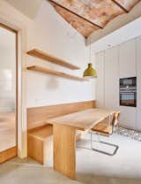 Kitchen/Dining Area of Serrahima Apartment by Forma Arquitectura