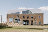 She Built a Surprising Home in the Shell of an Old Belgian Barn