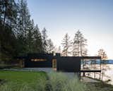 Bowen Island House exterior at dusk, by office of mcfarlane biggar architects + designers