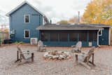 Rear view of the house with built-in fire pit.