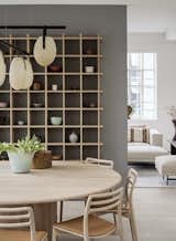 Jette Egelund Residence by Arcgency dining area and custom grid shelving