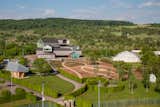 Before: A look at the soon-to-be verdant corner of the Vitra Campus, fringed with hills within a bucolic natural setting.