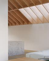 Warm Wood Finishes Sandwich the White Interiors of a Coastal Home in New Zealand - Photo 4 of 14 - 