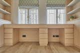 Plenty of drawer space for filing, stationery and ephemera in these (lockable) twin desks!  Photo 14 of 23 in Before & After: Built-In Storage Unlocks the Potential of a Family’s Small Hong Kong Flat