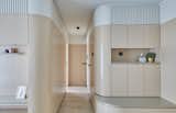 Clever cabinetry does double duty as storage space and an eye-catching component.