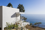 The unadorned, white-painted facade of the cube-like villa provides a clean foil for E-1027’s&nbsp;raison d'etre: a glorious view of the Mediterranean Sea. 
