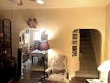 Office of Things design for Glendale, Queens row house renovation, the view of the dining room and stairwell arched doorframes. Before the project.  Photo 5 of 13 in Before & After: A 1920s Row House Gets an Art Deco–Inspired Update in Queens