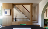 Office of Things design for Glendale, Queens row house renovation, custom millwork frame for stairwell. After the renovation.