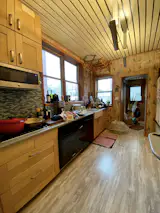 After several DIY renovations, Gary still didn't have the kitchen he wanted. The busy wallpaper and tile work, as well as countertop clutter created by a lack of adequate storage, made the space visually chaotic. To make matters worse, the 10-year-old countertop material was difficult to maintain. The kitchen's transformation was the part of the renovation Gary was most excited about.