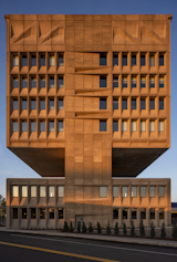 For roughly 20 years, Marcel Breuer’s 1970 Pirelli Building (also known as the Armstrong Rubber Building) sat largely empty beside the busy Interstate 95 in New Haven Connecticut, unused by its then-owner, Ikea, except as a way to advertise the store that shared its parking lot. Architect and developer Bruce Redman Becker of Connecticut firm Becker + Becker bought the site in early 2020 and converted the structure into a 165-room hotel.