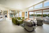 Living Room with views of the courtyard with mature olive tree and hummingbirds.