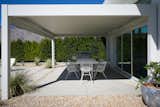 Covered dining for 8 with retractable roof and lights with BBQ gas griddle.