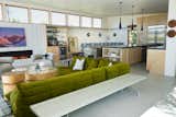 Open concept with living room, kitchen, bar, and dining.