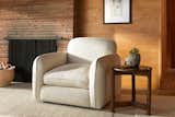 Rounded edges are a major component of the Parachute living room collection as you can see in the Grove side table and the Pillow chair, which comes in a swivel option.