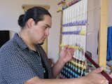 Venancio Aragon, a Diné weaver, at his loom. He’s the&nbsp;2020 Rollin and Mary Ella King Native Artist Fellow at the School for Advanced Research in Santa Fe, where he’s creating textiles that explore rare Navajo weaving techniques.