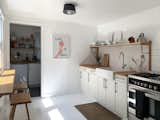 Kitchen.
Custom Perch Series shelving. Custom cabinetry. Cottage Series stools.
Artwork: Framed towel by David Shrigley