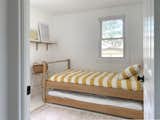 Kids Room. 
Custom trundle bed and Perch Series shelving.