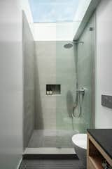 In the bathroom, a skylight above the shower lets the light pour in. 