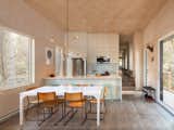 The chairs at the kitchen table were rescued from an old church.