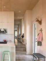 Storage was built in all down the hallway, making efficient use of a linear space.