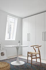 Nicole and Blair decided to build the main bedroom without a closet to maximize the square footage for furniture. Instead, they kitted out the smaller upstairs room with three full banks of IKEA cabinets. "It’s a nice way to live. You get out of bed and go to the changing room," says Blair. "It’s less cramped, and a better way to start your day."