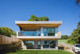 A rooftop deck is accessible from the rolling ladder inside.