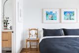 A Menu JWDA table lamp provides bedside lighting after dark.
