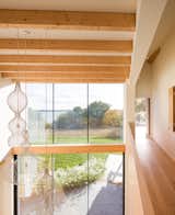 Spiers wanted "to be honest about the structure" and exposed the timber frame and glulam beams throughout the house. 