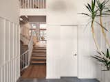 Hallway and Medium Hardwood Floor  Photo 3 of 15 in A Bright and Airy Home Brings Beach Vibes to Urban Toronto