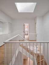 Hallway and Light Hardwood Floor  Photo 13 of 15 in A Bright and Airy Home Brings Beach Vibes to Urban Toronto