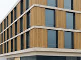 Wood and concrete make for a perfect pairing in the design of this modern hospital in Baden, Switzerland.