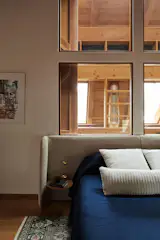 A Blu Dot bed with an Area Home duvet sits atop an Old New House rug. Carine used to work in the rug industry, so flooring tends to be a feature of her designs: “When you’re in the space a rug is a really big element,” she says. “Though not every one fo my clients is as excited about rugs as I am.” The ones used throughout this home are antique, each 50-plus years old — they’ve seen it all, making them less precious and delicate than a new design. 