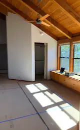 BEFORE: The lofty ceilings and window bench provided a great starting point for a modern update.