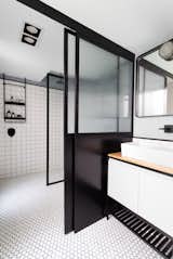 A fresh black-and-white look for the renovated bathroom.