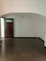 BEFORE: Though the archway had character, it blocked too much light. 